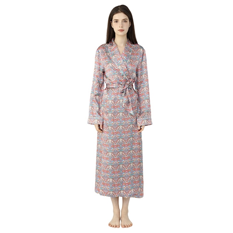 Brunette Lady wearing silk dressing gown in a pink and blue paisley print