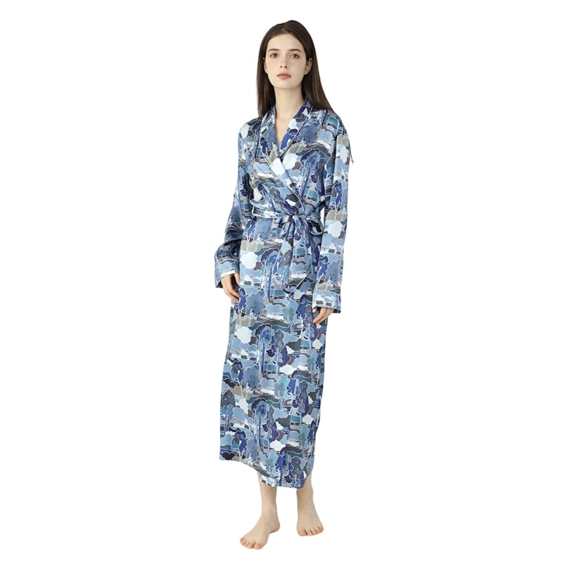 Brunette Lady wearing silk dressing gown in a blue flower print