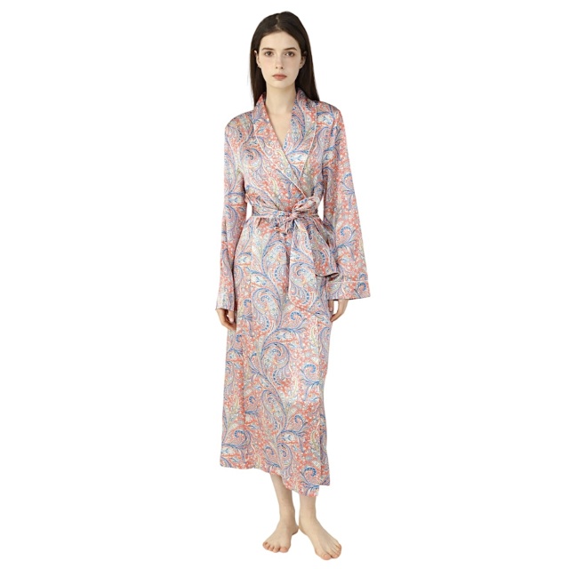 Brunette Lady wearing silk dressing gown in a pink paisley print