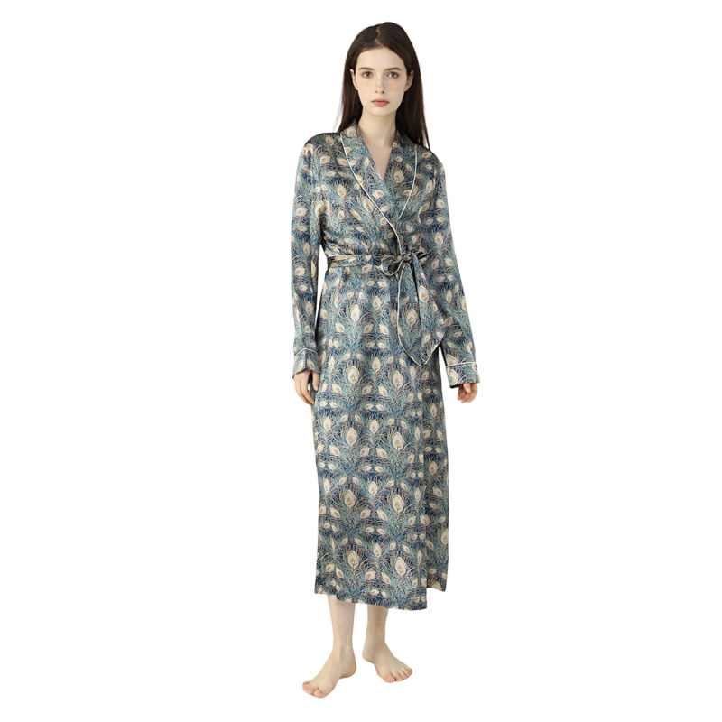 Brunette Lady wearing silk dressing gown in a peacock print