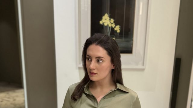 lady wearing khaki silk shirt